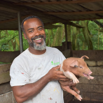 Huey with a pig at GLLF