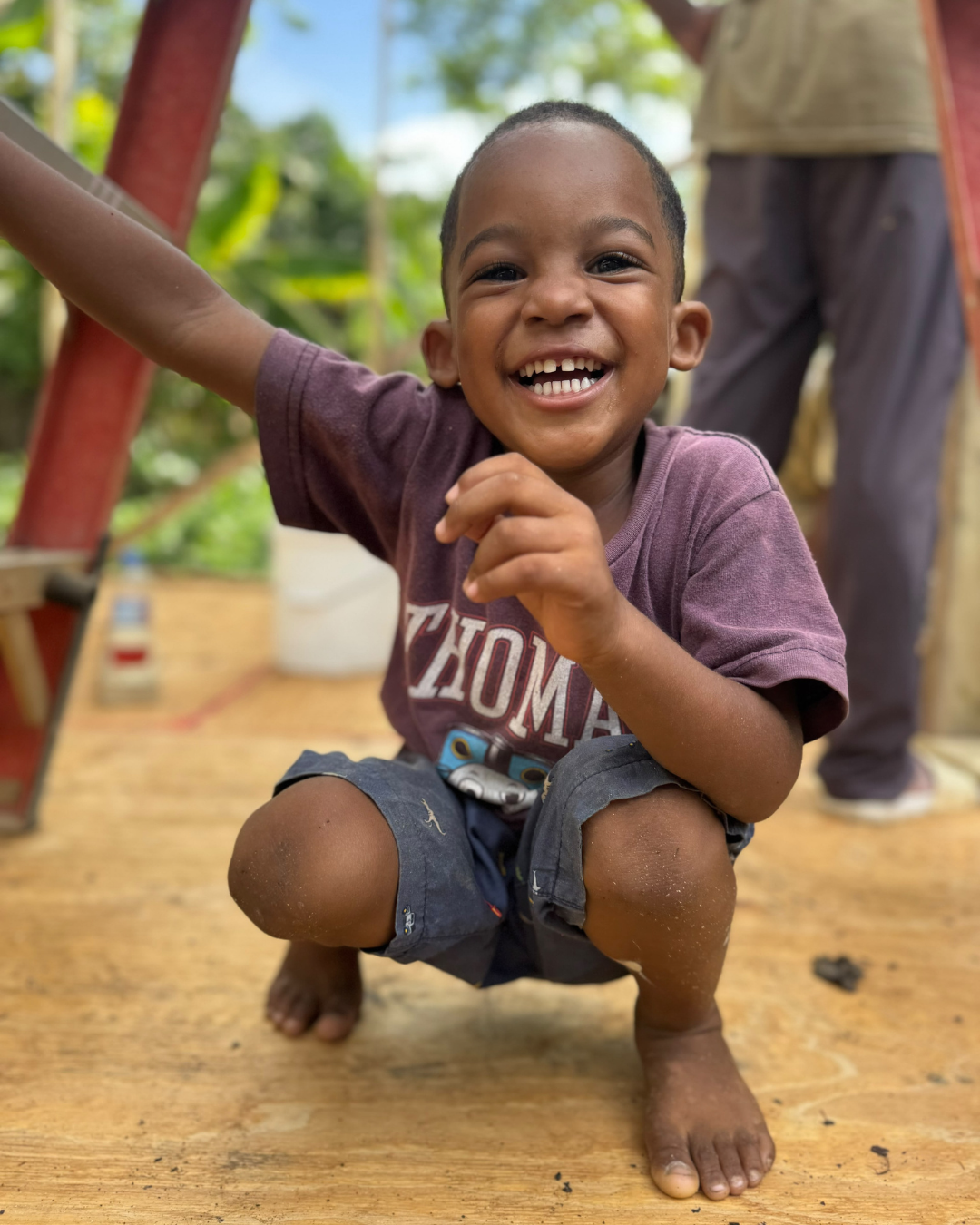 All Smiles at the Baggo Home Construction Site!